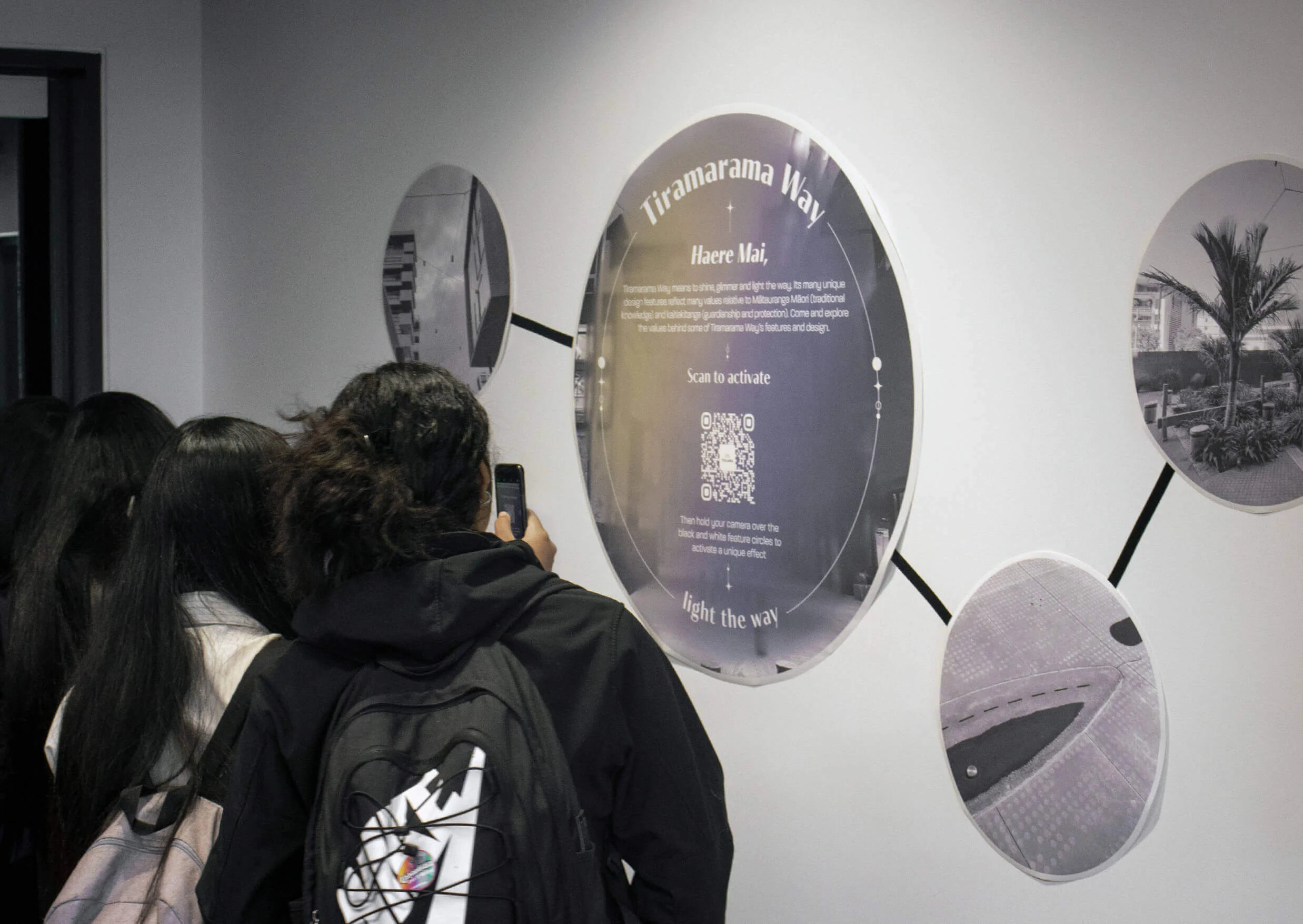 The AR-Activated mural being used by some participants